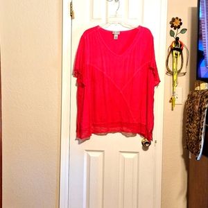 Hot pink blouse.